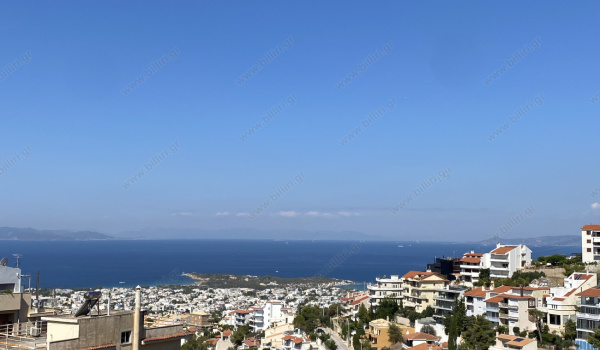 27_living_room_balcony_sea_view_day